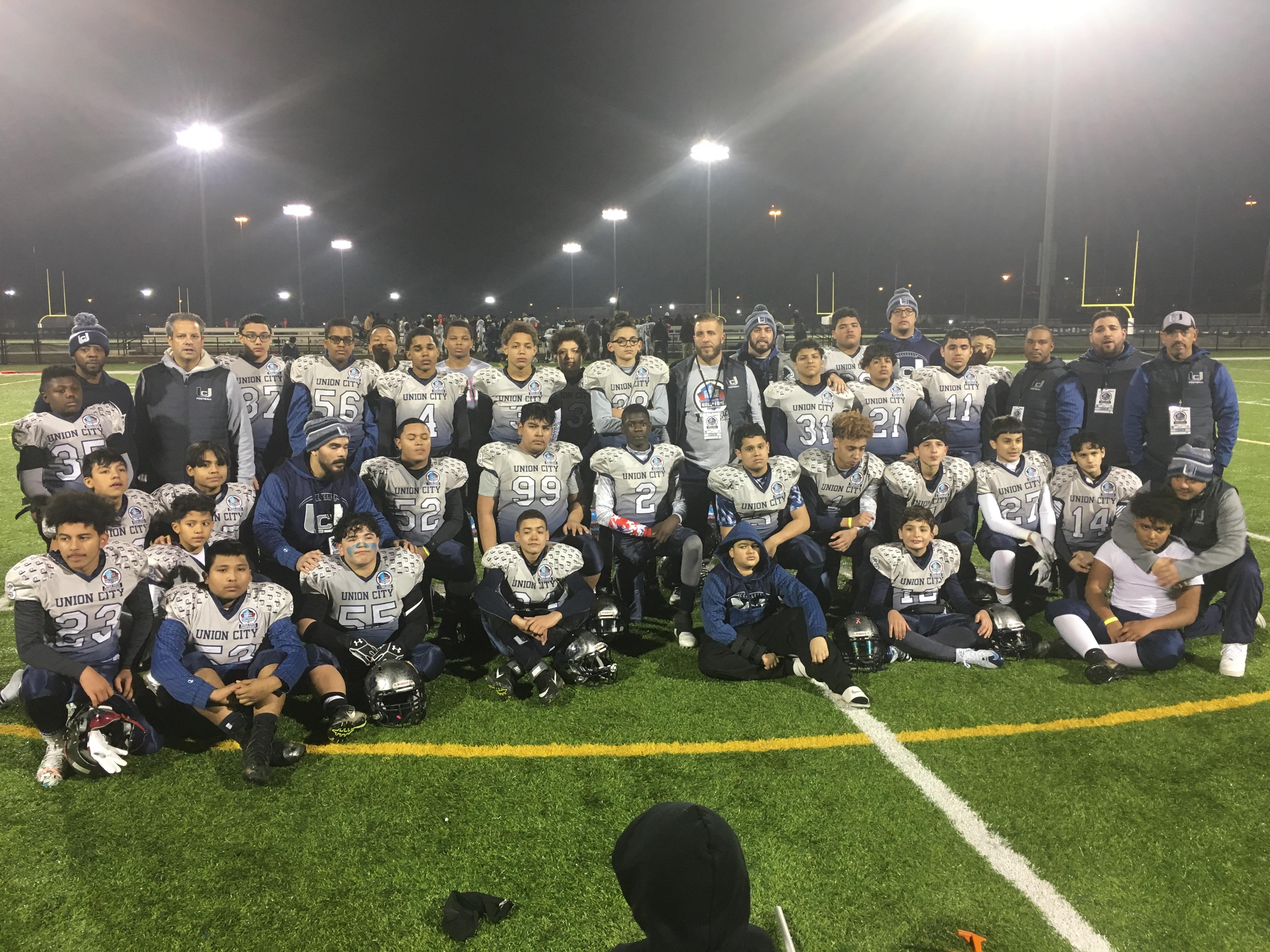 2018 UC Youth Football Team with Coaches