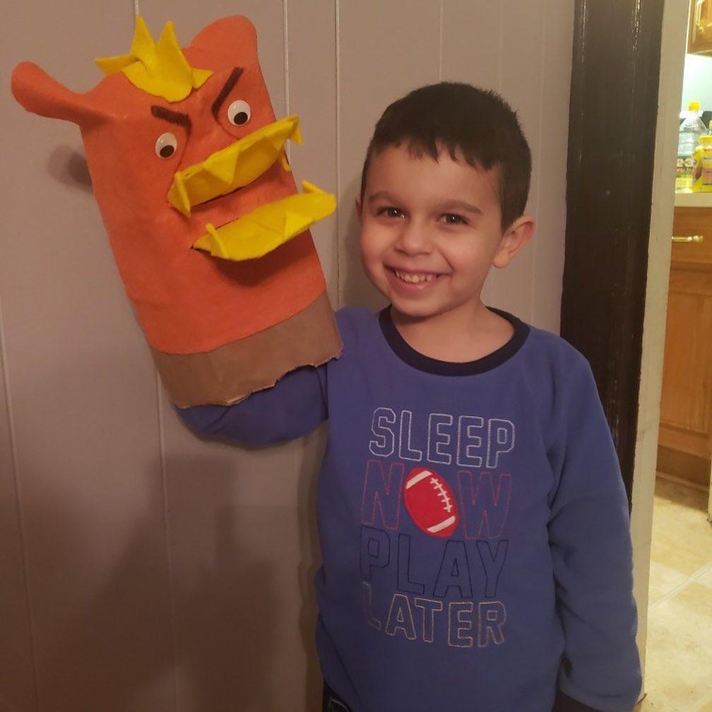 boy with large bag hand puppet